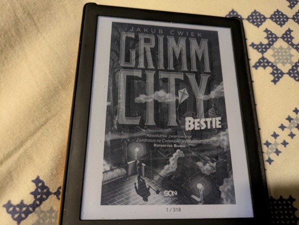 Okładka e-booka "Grimm City. Bestie" Jakuba Ćwieka. E-book ma 318 stron.